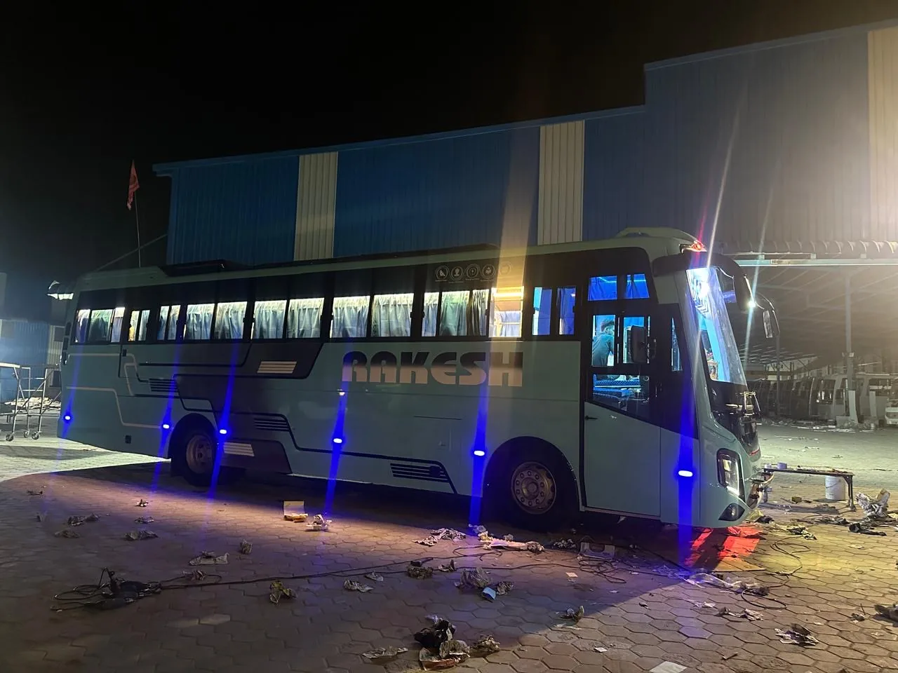Rakesh Travels bus at night
