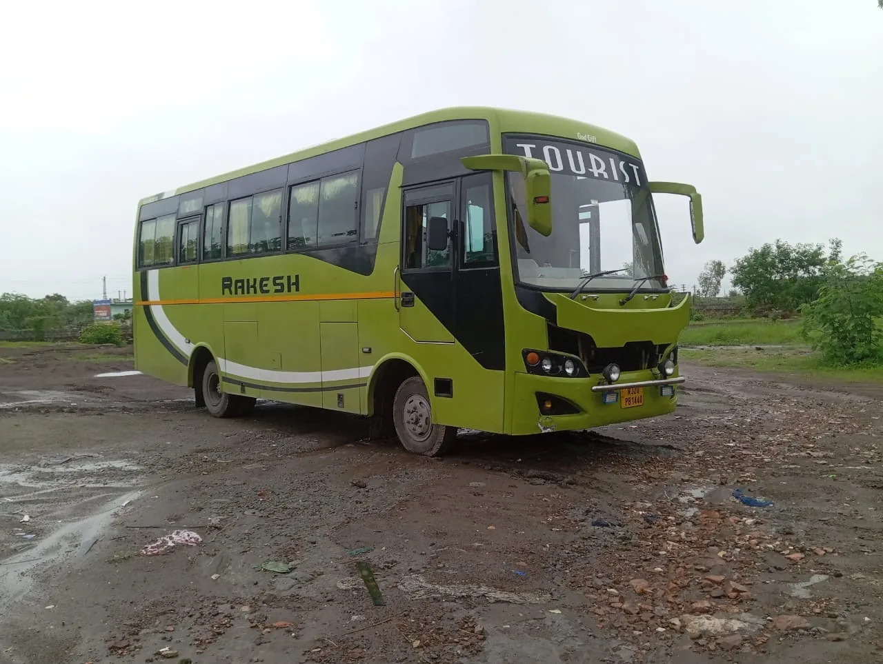 Rakesh Travels green tourist bus