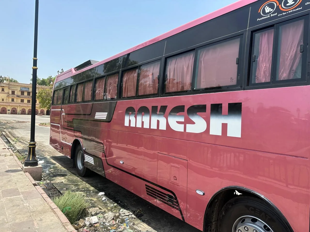 Rakesh Travels premium pink coach