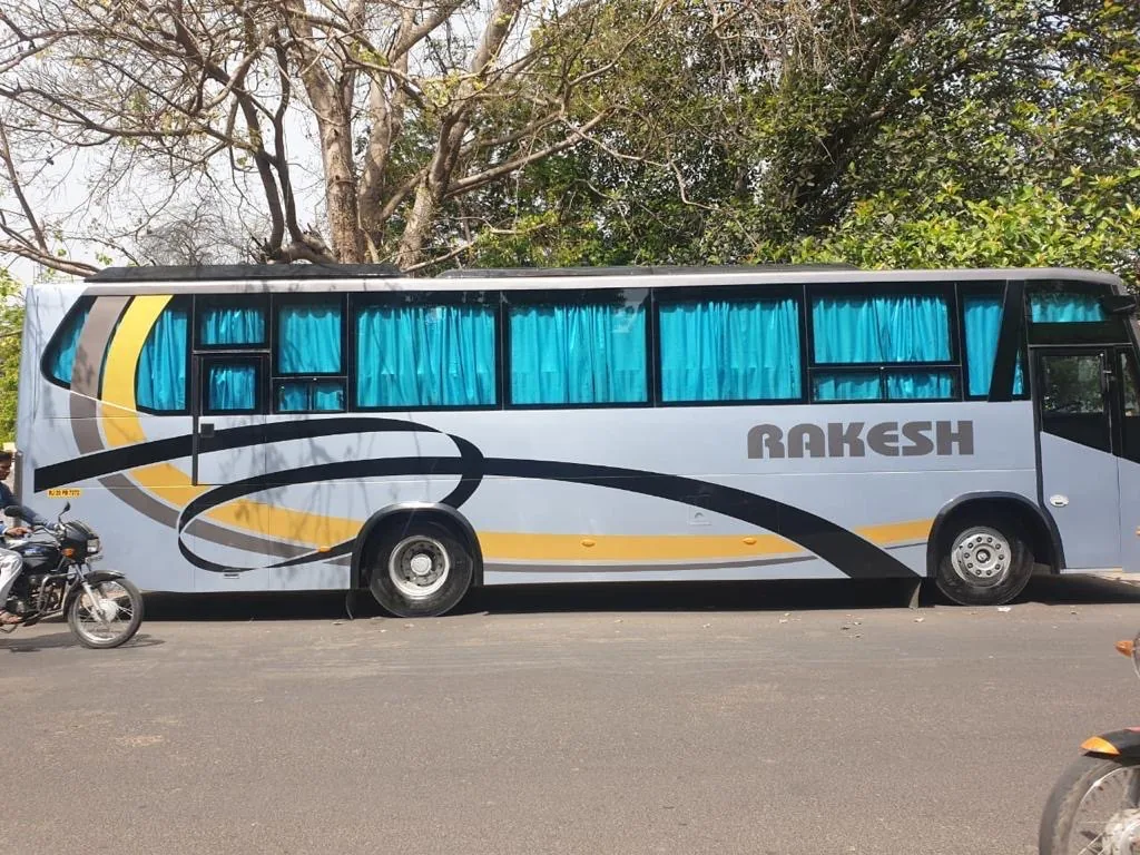 Rakesh Travels white coach