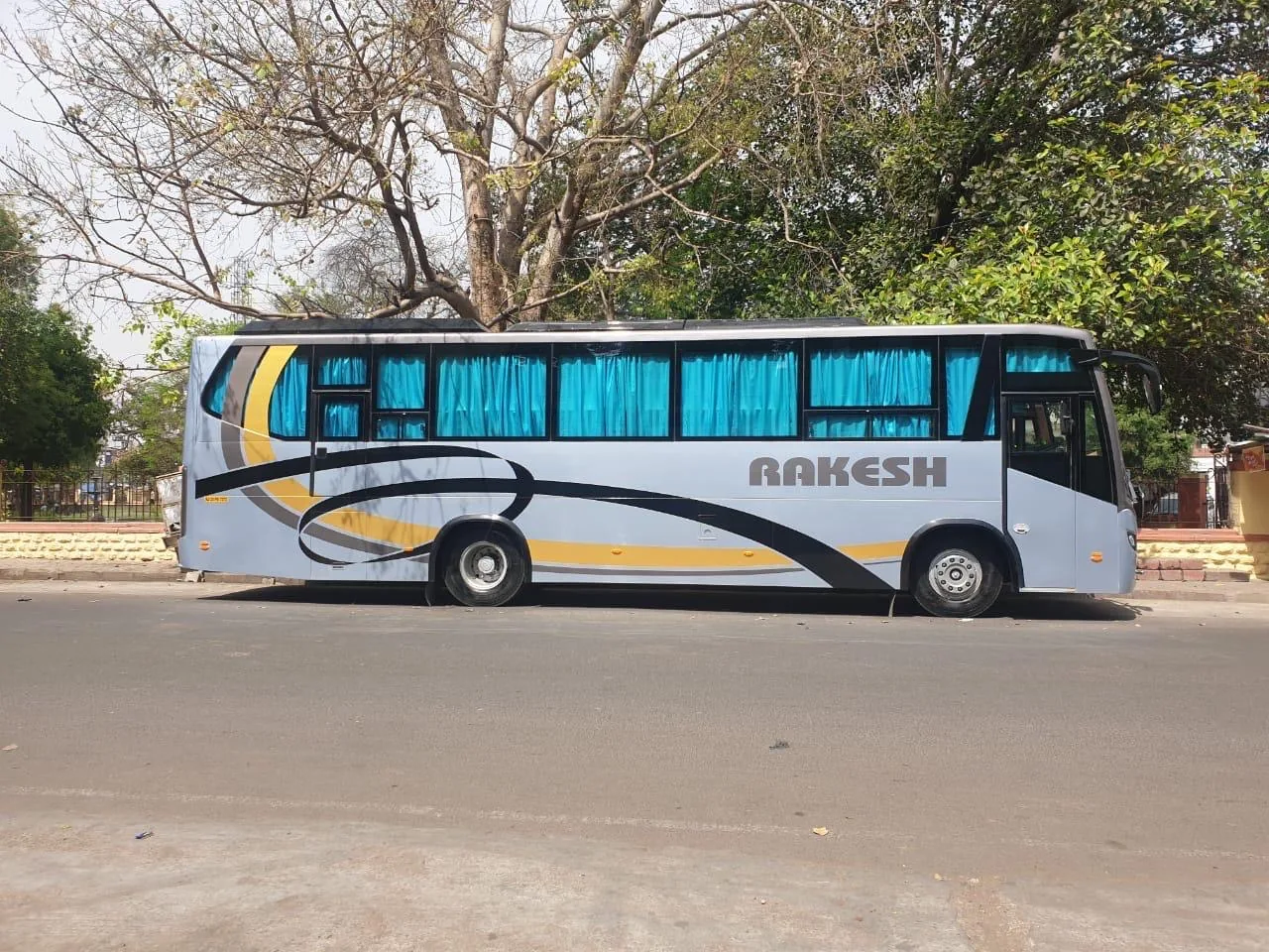 Rakesh Travels coach side view